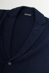 Navy wool jacket flatlay