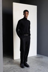 Black turtleneck model side