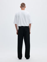 Black pants on model back view