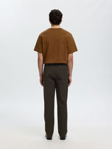 Brown pants on model back view